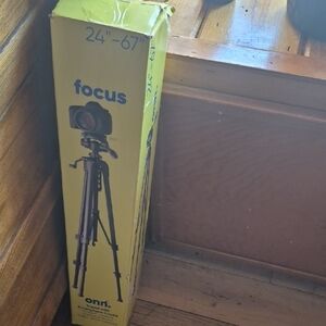 On Running Yellow Tripod for Cameras